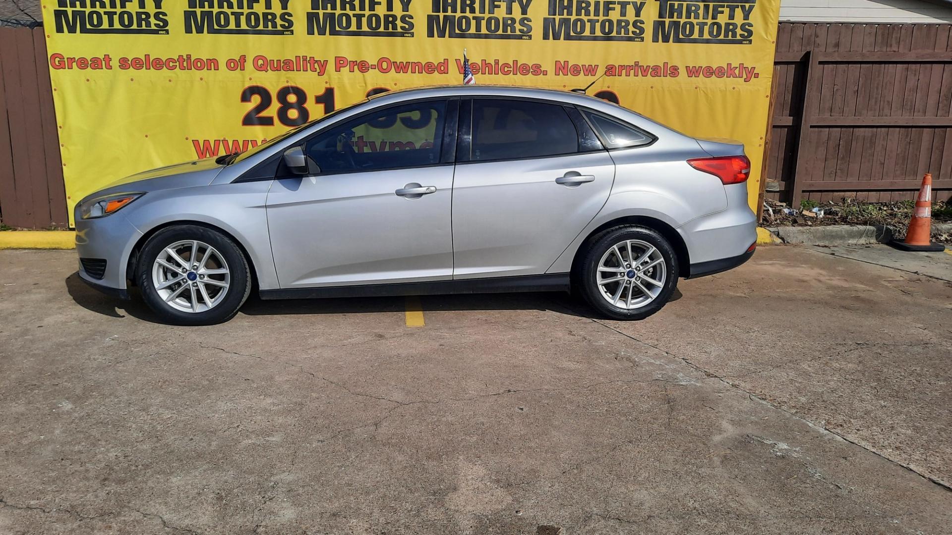 2018 Ford Focus (1FADP3FE7JL) , located at 16710 Clay Rd., Houston, TX, 77084, (281) 859-7900, 29.834864, -95.656166 - Photo#1